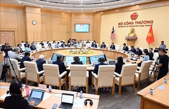 At the fourth meeting of Viet Nam - Malaysia Joint Trade Committee (Photo: VNA)