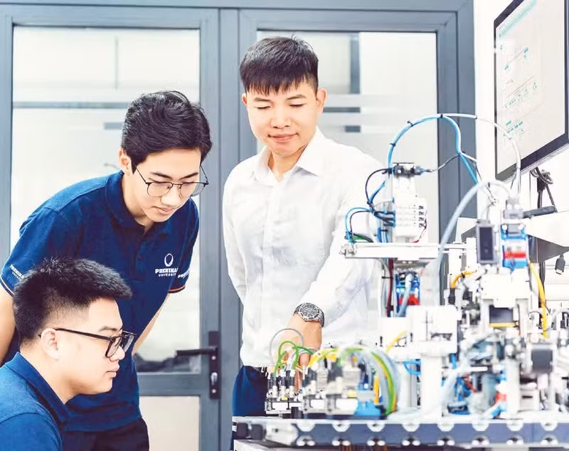 Students practise on modern equipment in a laboratory.