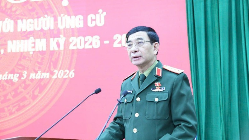 General Phan Van Giang speaks at the meeting. (Photo: DUY DUC)