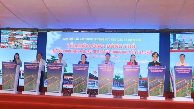 Deputy Prime Minister Pham Thi Thanh Tra (centre) and officials mark the start of work on the Ba Chuc inter-level boarding school for primary and lower secondary students in An Giang province on March 19. 