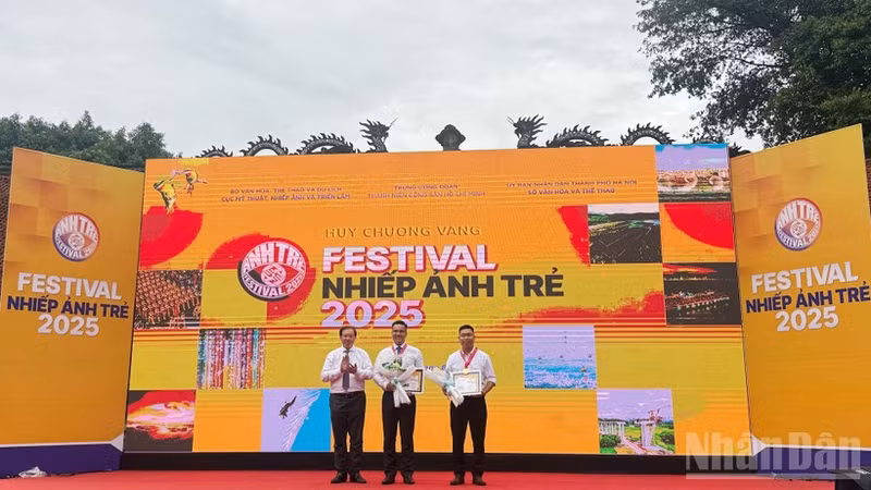 Winners receive gold medals at the ceremony.