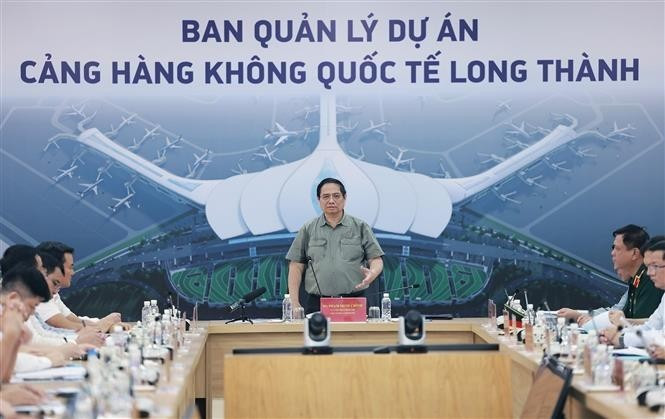 Prime Minister Pham Minh Chinh speaks at the working session with with Long Thanh airport's construction units in Dong Nai province on August 2. (Photo: VNA)