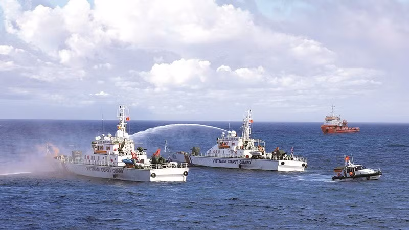 Vietnam Coast Guard trains in search and rescue at sea.