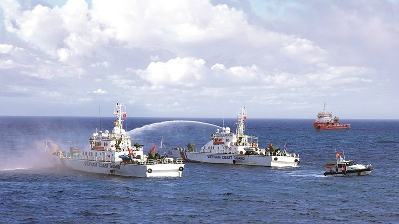 Vietnam Coast Guard trains in search and rescue at sea.