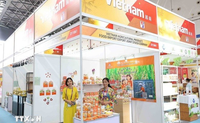 A Vietnamese booth at a fair in China. (Photo: VNA)Vietnamese Trade Counsellor in China Nong Duc Lai (Photo: VNA)