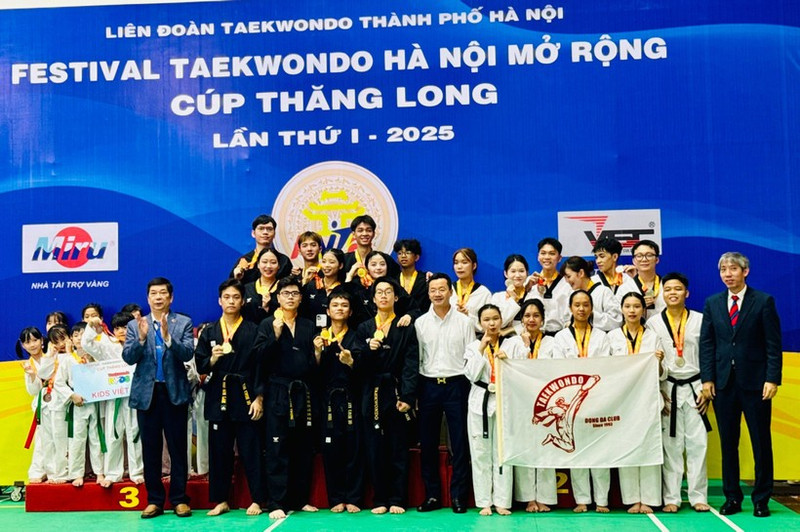 Martial artists receive prizes at the closing ceremony.