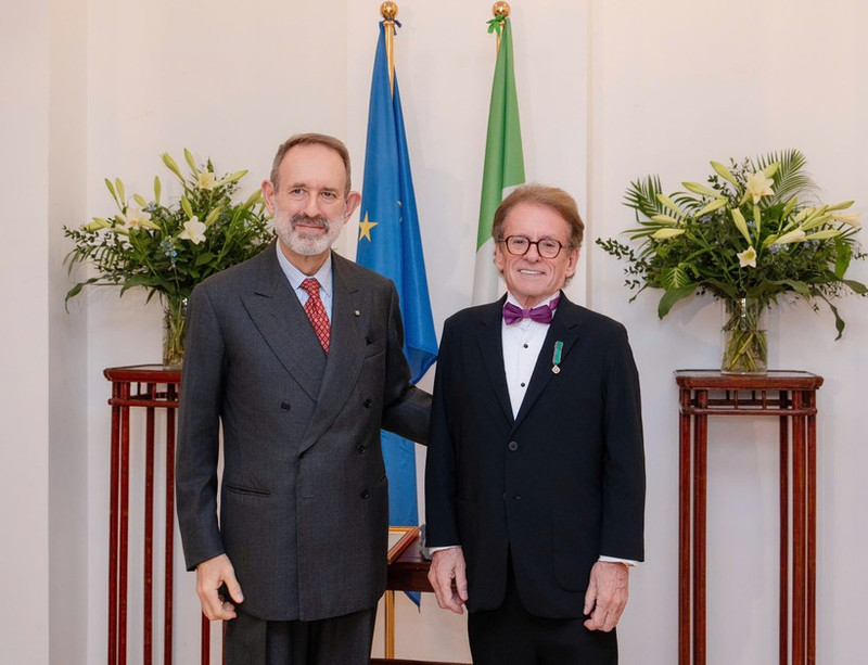 Greig Craft (right) and Marco della Seta, Ambassador of Italy to Viet Nam, at the medal presentation ceremony.
