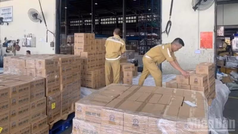 Relief supplies are carefully packed and inspected before undergoing the next stages of the transportation process.