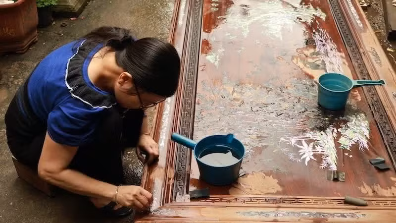 One stage in the mother-of-pearl inlay process.