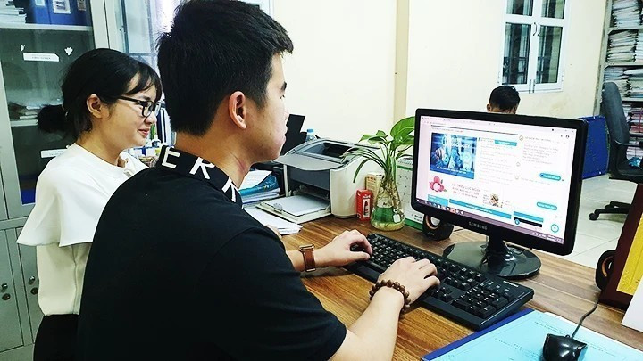 Units are urgently digitising documents. (Photo: Nhan Dan Newspaper)