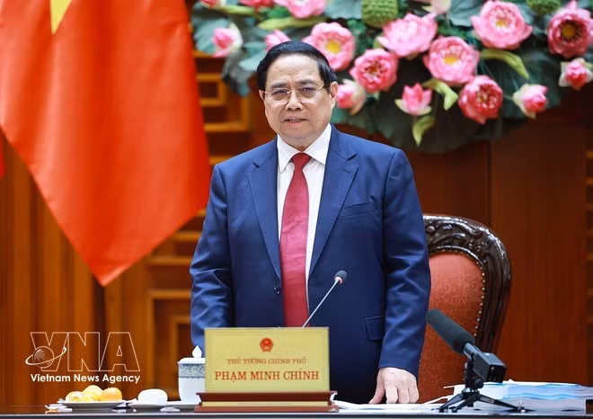 PM Pham Minh Chinh speaks at the meeting (Photo: VNA)