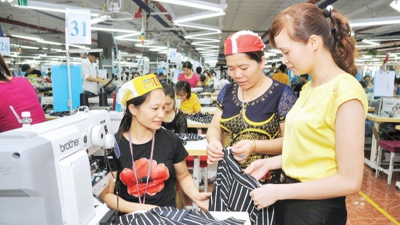 Garment processing for export at Bac Giang Garment Corporation Joint Stock Company (Bac Ninh). (Photo: KHANH AN)