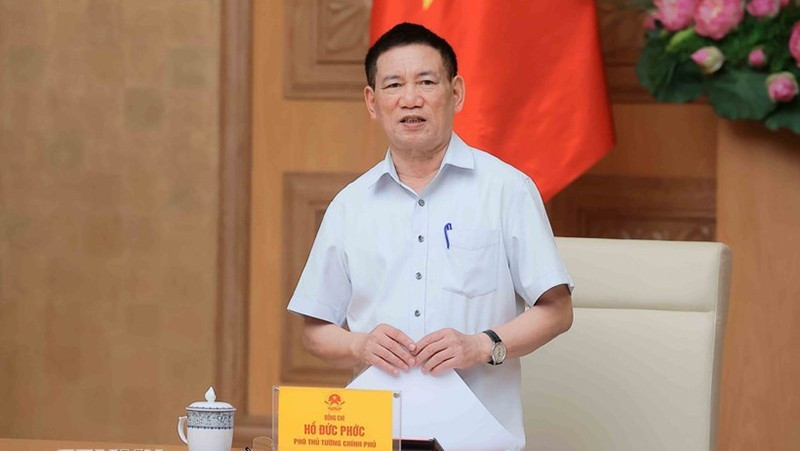 Deputy Prime Minister Ho Duc Phoc chairs the meeting of the National Financial and Monetary Policy Advisory Council. (Photo: VNA)