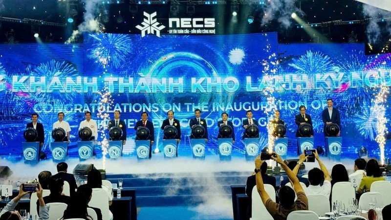 Delegates perform the inauguration ceremony of the New Era Cold Storage facility in Tay Ninh.