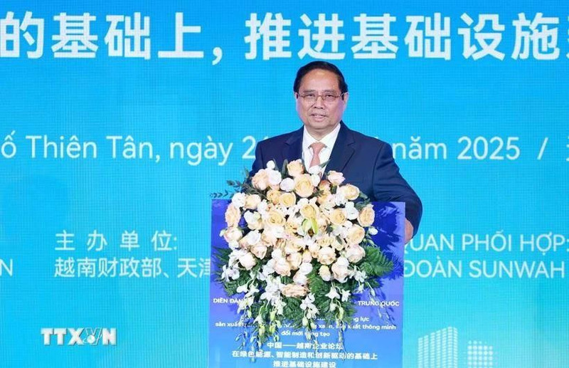 Prime Minister Pham Minh Chinh addresses the Viet Nam-China business forum. (Photo: VNA)