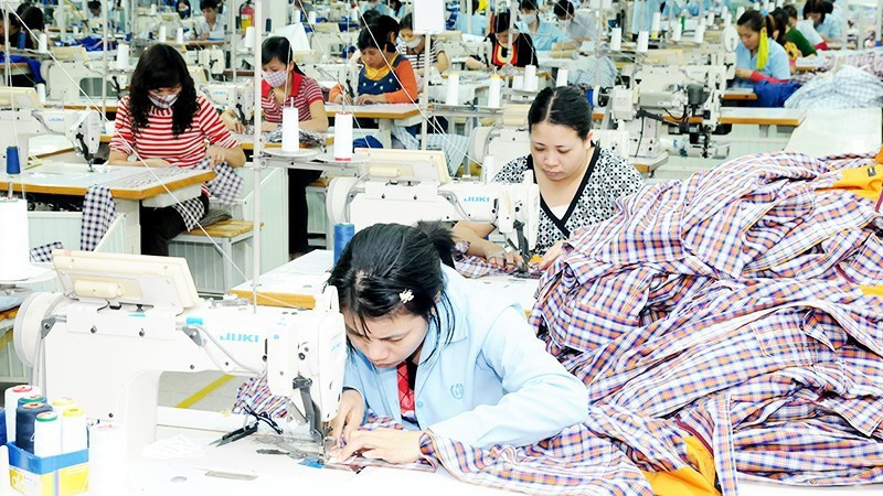Export-oriented garment production line at Duc Giang Garment Joint Stock Company. Photo: NAM ANH
