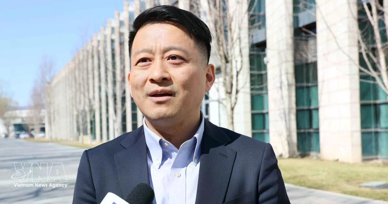 Professor Qu Qiang, commentator for the China Global Television Network (CGTN) and lecturer at the Minzu University of China, in an interview with the Viet Nam News Agency (Photo: VNA)