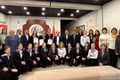 Delegates pose for a group photo. (Photo: THANH THE)