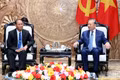 General Secretary of the Communist Party of Viet Nam (CPV) Central Committee and President To Lam (R) receives Vilay Lakhamphong, Politburo Member and Standing Member of the Secretariat of the Lao People’s Revolutionary Party (LPRP) Central Committee in Ha Noi on October 15. (Photo: nhandan.vn)