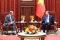 General Secretary of the Communist Party of Viet Nam Central Committee and President To Lam (R) meets with President and CEO of Qualcomm Incorporated Cristiano Amon in Ha Noi on August 27. (Photo: nhandan.vn)