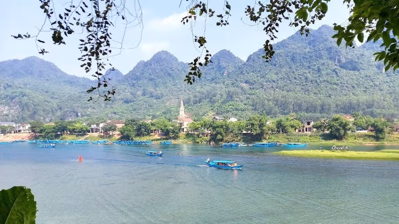 Boats carry visitors on a tour of Phong Nha Cave.
