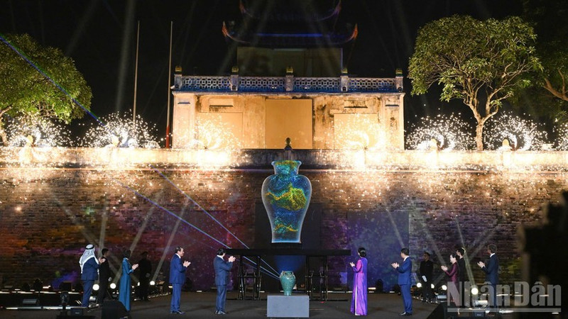 Guests take part in the opening ceremony, which features a blend of traditional craftsmanship and modern technology. 