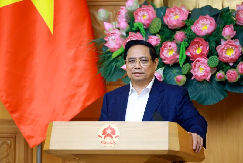 Prime Minister Pham Minh Chinh speaks at the fourth meeting of the Central Steering Committee for Housing Policy and Real Estate Market on December 17. (Photo: VNA)