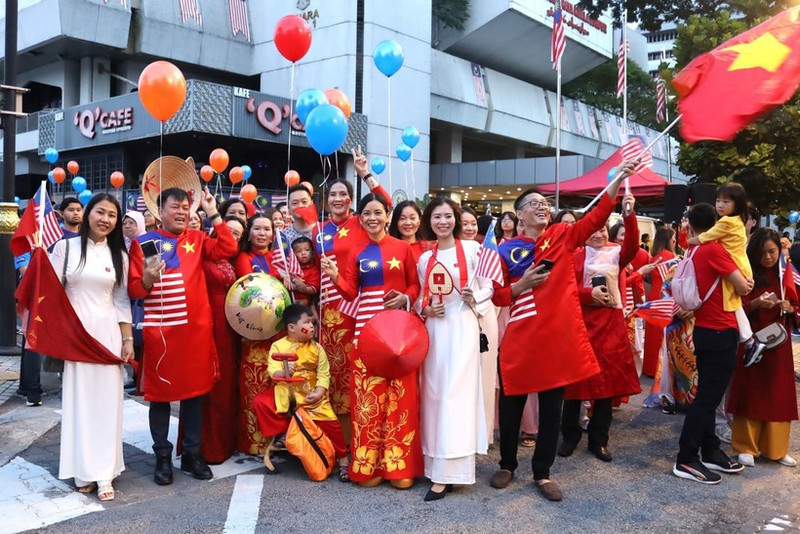 Vietnamese people take part in activities celebrating the 80th anniversary of Viet Nam’s National Day in Kuala Lumpur, Malaysia. (Photo: VNA)