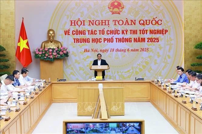 Prime Minister Pham Minh Chinh speaks at the national conference on the organisation of the high school graduation examination on June 18. (Photo: VNA)