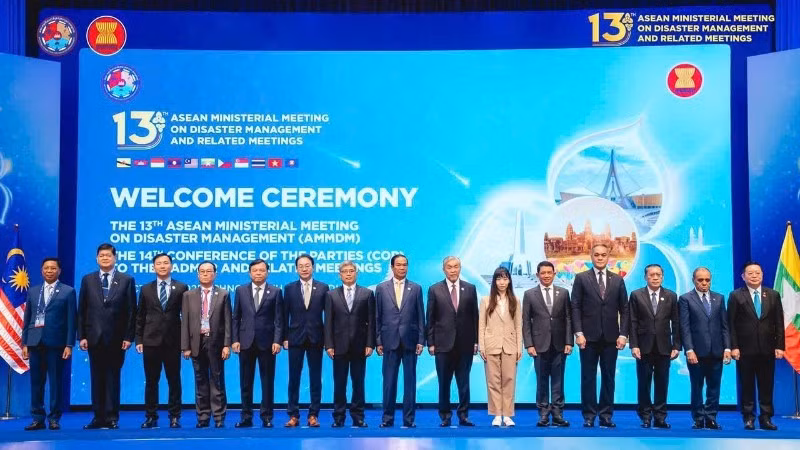 Delegates attend the meeting.