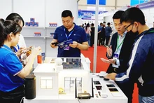 Smart electrical devices developed by Vietnamese enterprises showcased at a technology exhibition. Photo: BAC SON