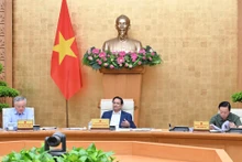 Prime Minister Pham Minh Chinh chairs the July Government session on law-making.
