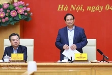 Prime Minister Pham Minh Chinh, Secretary of the Government Party Committee, speaks at the event. (Photo: VNA)