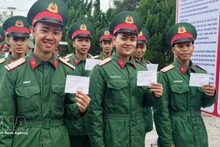 Soldiers in Con Co special zone of Quang Tri province enthusisastically join the general election on March 15. (Photo: VNA)