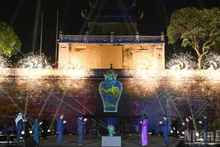 Guests take part in the opening ceremony, which features a blend of traditional craftsmanship and modern technology.