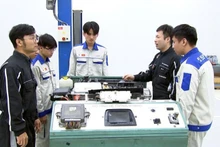 Students practise technology skills in an enterprise-linked training programme at Ha Noi College for Electro-Mechanics.