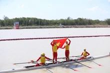 Bui Thi Thu Hien, Nguyen Giang, Dinh Thi Hao, and Pham Thi Hue celebrate after winning gold in the women’s quadruple sculls final at the 33rd SEA Games. (Photo: VNA)
