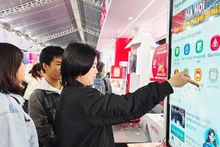 Residents access smart city services. Photo: NAM HAI