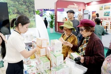 Agricultural cooperatives introduce their products at a trade fair. Photo: NAM NGUYEN