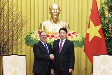 State President Luong Cuong (R) and Bruno Rodríguez Parrilla, Politburo member and Minister of Foreign Affairs of Cuba (Photo: VNA)