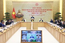 Prime Minister Pham Minh Chinh chairs a conference on January 14 to review the follow-up and implementation of the international agreements and commitments in 2021 - 2025 (Photo: VNA)