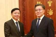 Deputy Prime Minister Tran Hong Ha (L) and Wang Dongming, Vice Chairman of the Standing Committee of the National People's Congress of China. (Photo: VNA)