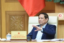 Prime Minister Pham Minh Chinh chairs a meeting with ministry and sector leaders on preparations for the exhibition, to be held in celebration of the 80th anniversary of the National Day (September 2, 1945 –2025). (Photo: nhandan.vn)