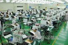 Electronic components production line at Flexcom Viet Nam Co., Ltd. in Yen Phong Industrial Park, Bac Ninh province (Photo: VNA)