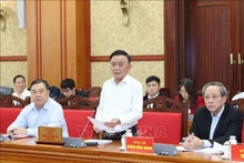 Politburo member and permanent member of the Party Central Committee’s Secretariat Tran Cam Tu speaks at the event in Ha Noi on December 19 (Photo: VNA)