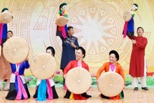 The Viet Nam Puppet Theatre performs the “Spring Festival” programme at the Lung Cu Ethnic Minority Boarding Secondary School.