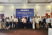 Delegates pose for a group photo at the workshop.