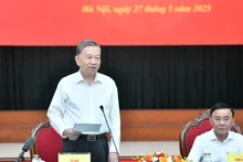 On behalf of the Politburo, General Secretary To Lam signed and issues Resolution No.72-NQ/TW. (Photo: DANG KHOA)