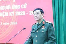 General Phan Van Giang speaks at the meeting. (Photo: DUY DUC)