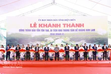 Prime Minister Pham Minh Chinh and delegates cut the ribbon to inaugurate the project to preserve and restore the Him Lam resistance centre relic site (Phase 2). (Photo: VNA)